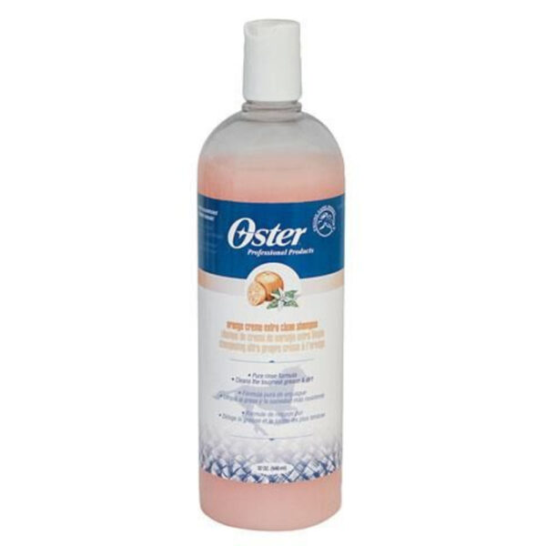 Flacone trasparente Oster da 946 ml di shampoo Orange Creme, liquido pesca, tappo bianco e arancia sull'etichetta blu.